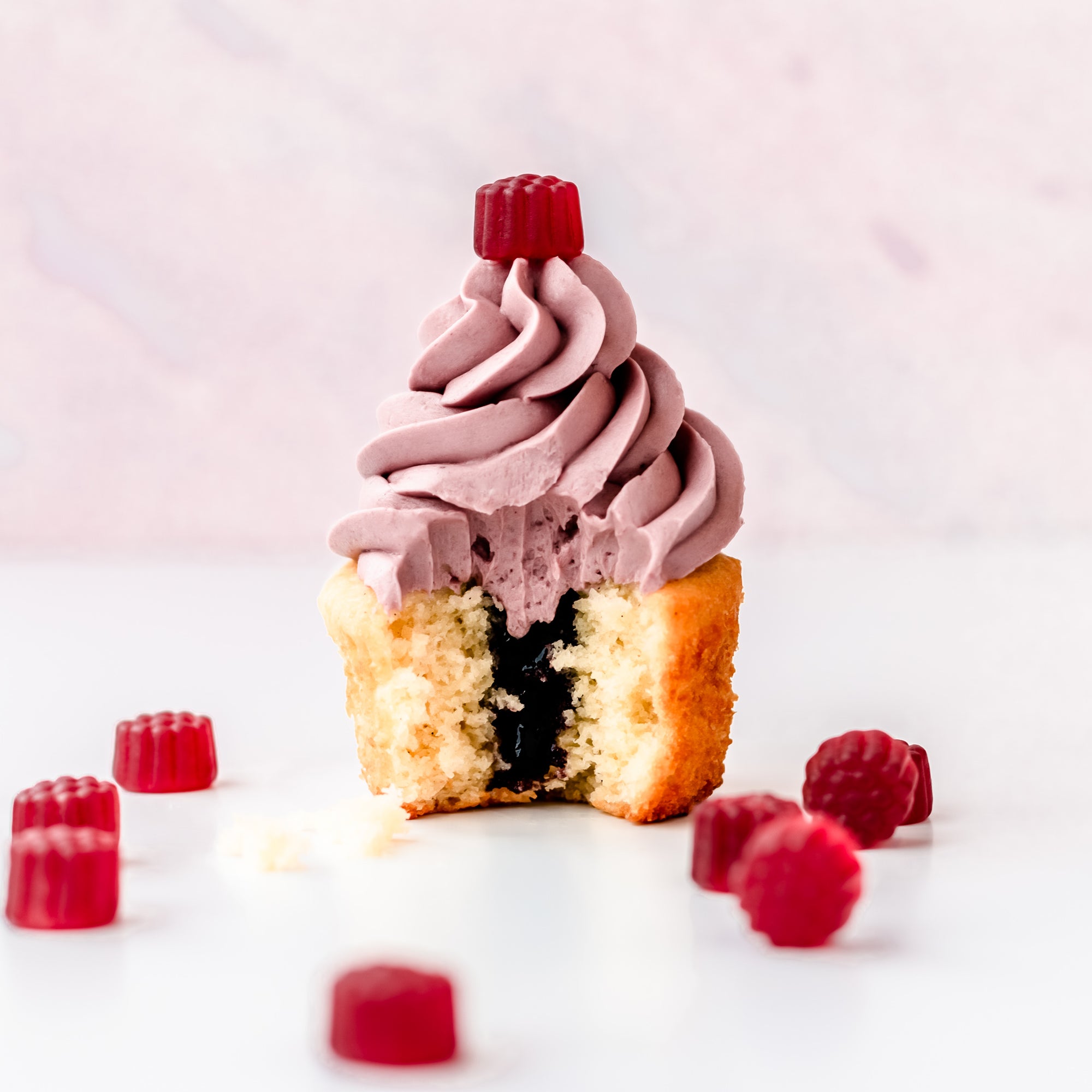 Vanilla Cupcake with Elderberry Jam filling Elderberry Frosting